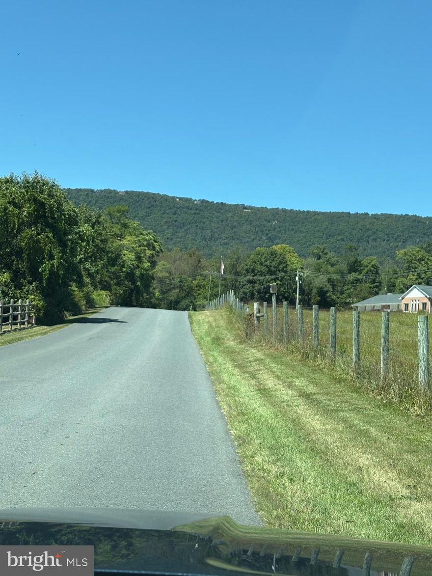 Come see the views in this mountain community, potential building lot .64 acres, build your possible full or part time home or just recreational use. Hard top roads, road maintenance & amenities. Fishing, boating, Beach area, 2 recreational park areas, picnic pavilion, fishing ponds, baseball field, basketball hoops. Take a ride to the top & enjoy all the wonderful Mountain Views.  Peaceful & Quiet, Short distance to shopping, schools, Hospital and main roads, Rt 50, RT 37, I 81. 
Also for Sale Lots 101, 102, 103 
Also For SaleTomahawk Trail Lot 132 - 133