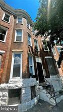 Excellent Investment Opportunity Awaits! Welcome to 1904 Mosher Street, a large home offering grand sized spaces sure to be enjoyed! This is a long-time tenant occupied Property with impressive income potential, currently generating $15,816 in annual revenue. The in-place tenant wishes to stay on and is currently paying $1,318 monthly. Access for showings are based on friendly tenants schedule usually within 24-48 hours- but will do best to accommodate. This home offers 5 large bedrooms on the upper levels and has had a recent comprehensive renovation with a newer HVAC system, roof, kitchen, and updated bath on 4 levels which offer many charming architectural details including a beautiful staircase with original bannisters, a large sky light at the top landing, transom windows, and exposed brick walls. There is ample storage space in the basement which could be finished off for additional living space. The backyard features a fenced area and parking pad for hassle-free off-street parking. The location offers ease of convenience to major travel routes and downtown at an excellent price point. Buyer is responsible for verifying ground rent. This property is ideal for those seeking a solid investment opportunity in a great location! FIRST TIME HOME BUYERS HAVE UP TO 50K IN GRANT MONEY. CALL SONG HONG LISTING AGENT.