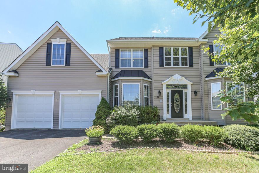 Welcome to 34 Landmark.  This warm and welcoming home is waiting for new owners.  Schedule a showing and let this home wrap it's arms around you.  Perfect for entertaining and just relaxing. There is a main floor office and library cozy enough to get comfortable with a good book.  The gourmet kitchen has plenty of cabinets with a generous island and breakfast bar with room for everyone at the breakfast table or have your coffee in the morning room.  The living room is adjacent to the kitchen and has a beautiful fireplace for cooler weather.  Upstairs is 4 bedrooms and 2 baths.  The primary bedroom has vaulted ceilings and two large walk in closets and a beautiful en suite.  The lower level offers a theater room, bar, wine closet and two additional bedrooms with full bath. And plenty of space for storage.
The U&L air conditioner units were replaced in 2018 and 2020, refrigerate 2020, dryer 2023 and the hot water heater replaced in 2015.   This home is in pristine condition.  There are so many tasteful features, you really have to see it to appreciate it.