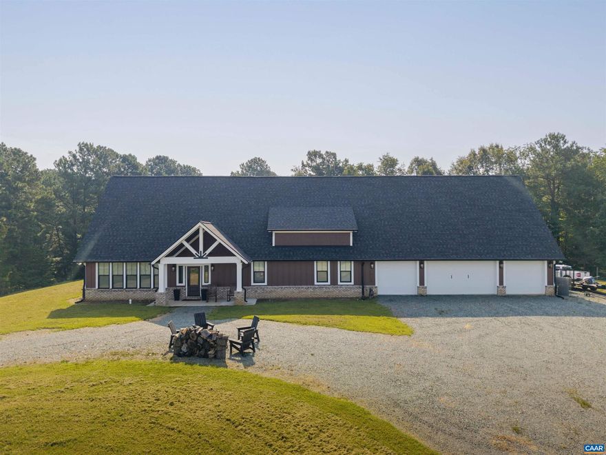 This custom built newer home sits atop a ridge with beautiful views of the South-West mountains. The 3200 sq ft home boast a modern layout consisting of a large family/kitchen space with fireplace, and vaulted ceiling. The home's 3 bedrooms, including the primary are all located on the ground floor. Also on the main floor are two full baths, and one half bath The 3+ bay attached garage has access into the home through the mudroom. Above the garage is a large finished space with a full bathroom. The land is mostly open pasture, and is all fenced for livestock, with automatic waterers. The land is further enhanced by a pole barn. Conveniently located between Orange and Gordonsville, yet very private.