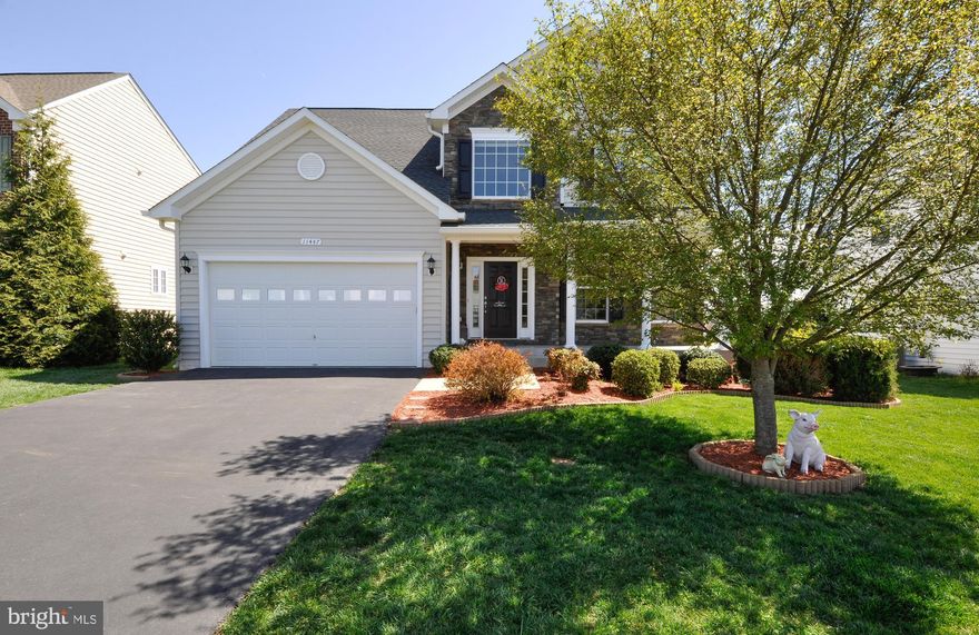 What a find! This beautiful colonial nestled in the Hopyard Farm neighborhood, is ready and waiting on it's new owners. Light and warmth welcome you from the moment you step into this lovely home. The open 2 story foyer leads you into the breathtaking kitchen with it s stylish wall tile, granite counters, double oven and cooktop; perfect for the inspired home chef. A generous-sized family room looks back at the kitchen area and the sunroom with its vaulted ceilings and numerous windows looking out onto the open backyard area and composite deck. Enter the separate dining room from the entryway or the kitchen. This sophisticated room features large floor to ceiling windows, a trey ceiling and chair rail. The laundry room is conveniently located on the main level. Upstairs, the master bedroom has a sizable bathroom with a soaker tub, a separate shower and double sinks. Three more nicely sized bedrooms and a full bath share the upstairs area. One of the homes best features is its fabulously finished basement that provides additional living space including a full bath with chic tiling. A separate room in the basement could be used as a bedroom, office or workroom. Sliding doors lead out to the backyard. Hopyard Farm is rich in amenities including a large community recreation building with outdoor pools, workout room, billiards and more. Hopyard also offers tennis courts, play areas, a lending library and boat ramp. With Dahlgren and Fredericksburg only 20 minutes either way, its a fantastic location for commuting. Don t miss this one!