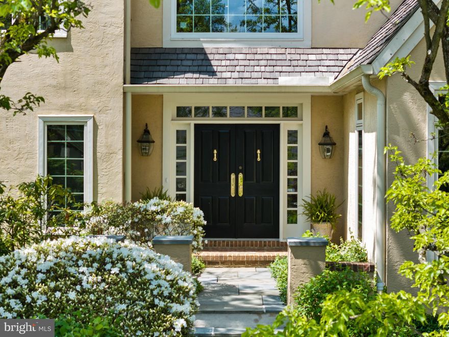 Experience living in this meticulously cared for Denbigh home, nestled within a secluded enclave of about 50 residences. Surrounded by acres of open space with meandering trails, this 3400 sq ft residence offers a serene escape. Step inside to discover the grandeur of the first floor, with a dramatic two-story foyer flooded with natural light. To the right, the library offers a tranquil retreat for work or study, complete with a fireplace and a wet bar. The inviting living room boasts a formal fireplace and is open to the dining room which features two sets of French doors opening to the back patio. The bright kitchen with its dining area provides ample space for entertaining and storage. The family room, with cathedral ceilings, fireplace and French doors overlooking the patio, creates an inviting ambiance, perfect for relaxation. Additionally, the main floor hosts the laundry room and a half bath. Upstairs, the spacious primary suite offers two walk in closets and a  bathroom. Two additional bedrooms and a hall full bathroom finish the second floor. The finished basement also has an unfinished area for storage. The breezeway was enclosed, with two large storage closets, leading to a two car garage. Outside, half walls surround all walkways and the rear patio for privacy. Most windows have been replaced while the surrounding stucco was repaired at that time and the cedar roof has been replaced. Wayne, just minutes away, and King of Prussia's specialty shopping are easily accessible, while being close to all major roadways such as 76, 476, and the PA Turnpike. This residence epitomizes refined living, blending luxury, convenience, and tranquility.