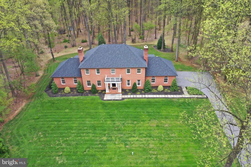 Lovely Laurelford / Padonia Farms offering! This custom built, all brick, home was thoughtfully designed by the original owner for comfortable family living, and meticulously maintained over its young life. Privately situated on a flat, 2+ acre, lot at the end of a culdesac and backing to acres of undevelopable forest. There is attention to detail around every corner, beautiful crown moldings throughout, starting in the welcoming foyer and flowing easily into the main level rooms, highlighted by a grand family that opens, as does the breakfast room, to a large deck overlooking the large, private backyard that leads to acres of peaceful forest. The upper level offers 4 BRs and 2Bas including a generous master suite complete with laundry room, walk in closets and luxurious master bathroom,  3 well sized bedrooms, a renovated hall bath and a bonus Jack and Jill den/office off 2 bedrooms. Finished basement includes a recreation room with wet bar and a guest room (bedroom 5) and full bath and rear exterior exit. A special opportunity on an amazing lot in one of Baltimore County’s most sought after neighborhoods. Roof recently replaced, new septic system. 2+ acres includes a small separately deeded lot that also conveys.