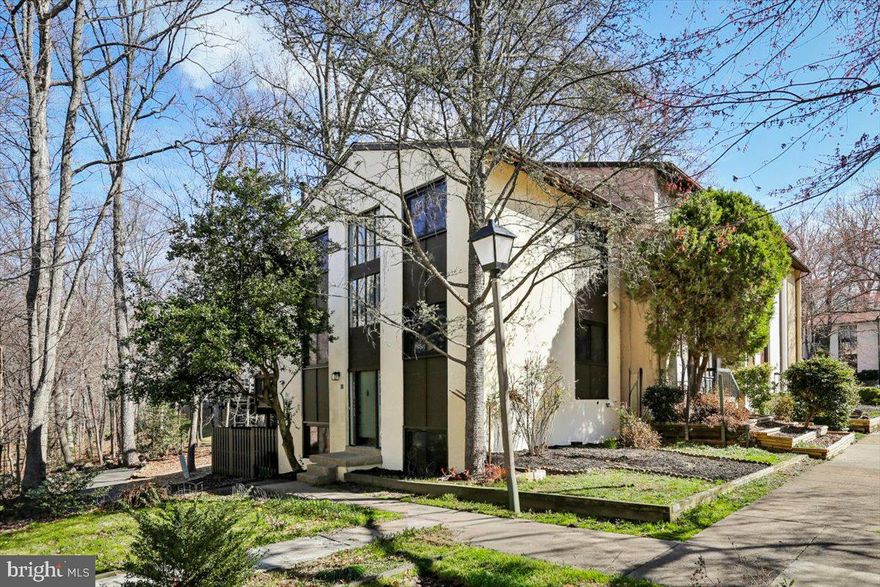 Welcome to this beautifully renovated end-unit townhome nestled among peaceful wooded surroundings, offering both privacy and natural views. Completely updated from top to bottom, this home features modern finishes, thoughtful upgrades, and brand-new appliances throughout, making it truly move-in ready.

The bright and open main level provides an inviting living and dining area, perfect for everyday living and entertaining. Large windows allow natural light to pour in while showcasing the tranquil wooded setting. 

Step outside to your private back patio, accessible directly from the walk-out basement, where you can relax, entertain, or simply enjoy the peaceful outdoor setting surrounded by trees.

As an end-unit, this home offers additional privacy, extra natural light, and a more spacious feel. With its complete renovation, modern upgrades, and desirable setting, this townhome combines style, comfort, and convenience—an exceptional place to call home.  Roof replaced 6/23.  HVAC and water heater replaced 10/22.     Windows and sliders replaced 1/25.  Move in ready!