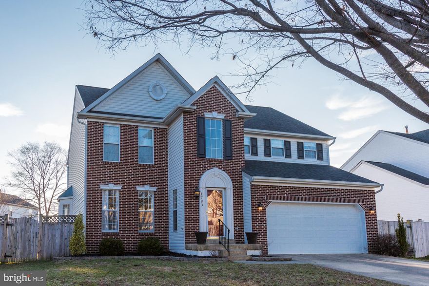Turnkey home!!!  This house is perfect!!  Upgraded light fixtures, gleaming hardwoods, large windows with lots of light, upgraded owner's bath, new carpet, new paint and so much more!  The outside boasts a large, fenced-in, flat yard. Close to shopping, entertainment and major commuter routes!!  A must see!!  Make an appointment today!!