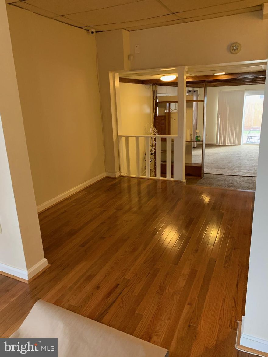 Well-kept split-level home with 3 bedrooms and 2 full baths and is close to the metro. Large master bedroom with walk-in closet. Fireplace in family room with walk-out to beautiful fenced yard with shed. Attached carport with parking for 4 vehicle.  Beautiful wooden floors in the Dining and Living rooms a must see