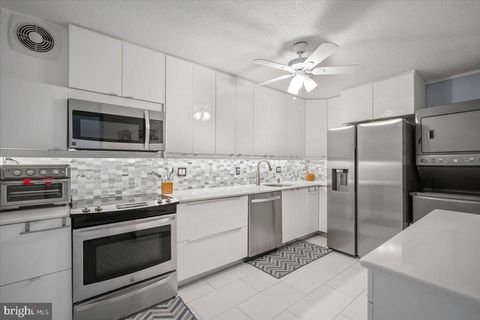 Photo of 8380 Greensboro Drive #303, MCLEAN, VA 22102 (MLS # VAFX2298604)