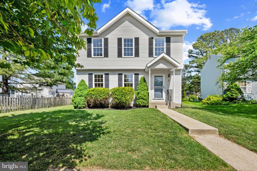 Inviting Colonial residence offering 3 bedrooms, 3.5 updated bathrooms, and 1,540 finished square feet in desirable Bloomingdale Heights. // A private two-car driveway and lush landscaping create a welcoming first impression. Step inside to a freshly painted interior where hardwood floors extend throughout the traditional main level. The foyer includes a convenient powder room and opens into a spacious formal living room that flows seamlessly into the formal dining room, highlighted by a sparkling chandelier and a classic chair rail. // Updated in 2026, the eat-in kitchen features recently installed stainless steel appliances, Formica countertops, charming sage green cabinetry, a pantry, and a cozy breakfast area with direct access to the deck. // Upstairs, the upper level offers three carpeted bedrooms, with carpet replaced in 2024, and two full bathrooms, including the comfortable owner’s suite with a private ensuite bath. // The partially finished walk-up lower level features LVT flooring throughout an expansive recreation room with a gas fireplace, along with a versatile bonus room ideal for a home office, gym, or guest space, and a full bathroom. Additional unfinished space provides room for storage or future customization and includes laundry facilities. // Enjoy outdoor living on the deck, perfect for dining alfresco while overlooking the flat backyard.