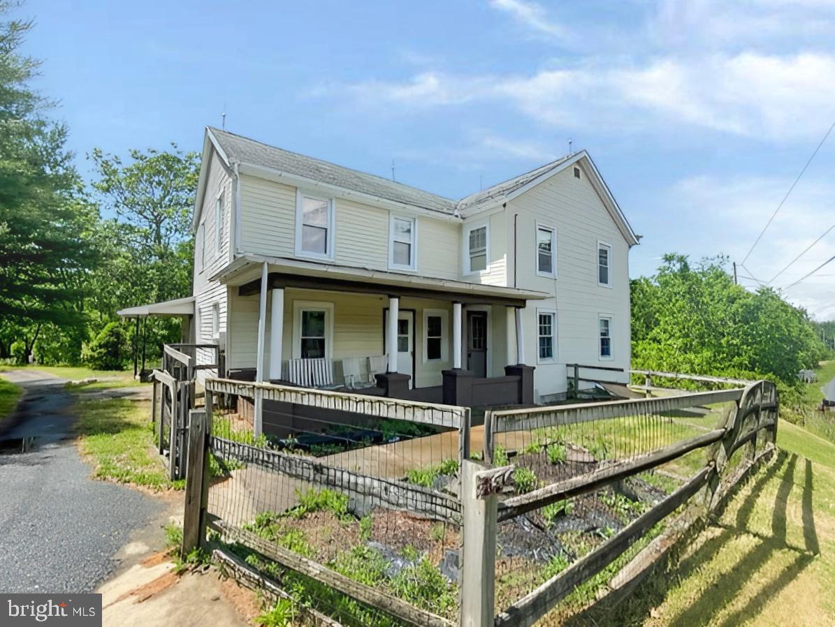 Updated farmhouse on 4.96 acres located in Centre Township, Schuylkill Valley School District. Features four bedrooms, formal dining room plus eat-in kitchen. First floor family room. Spacious room sizes. Detached garage. Fantastic view.