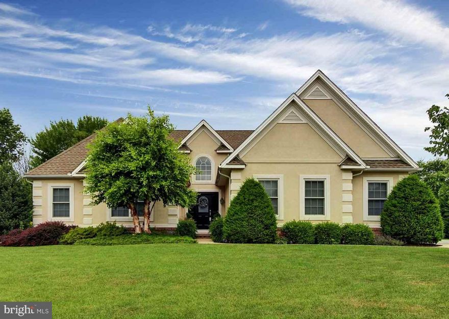 Perfect home for entertaining! This lovely 4 bedroom, 3.5 bath rancher is located in a desirable neighborhood in Central Schools and backs up to Cousler Park. Formal LR w/gas fp, gourmet kitchen w/granite counters & ceramic tile flooring. Large master suite w/full BA w/walk-in shower. Fin walkout basement w/wet bar/kit & gas fp. New upper Trex deck w/glass railings, covered patio, professionally landscaped , retaining walls, fire pit, lily pond.