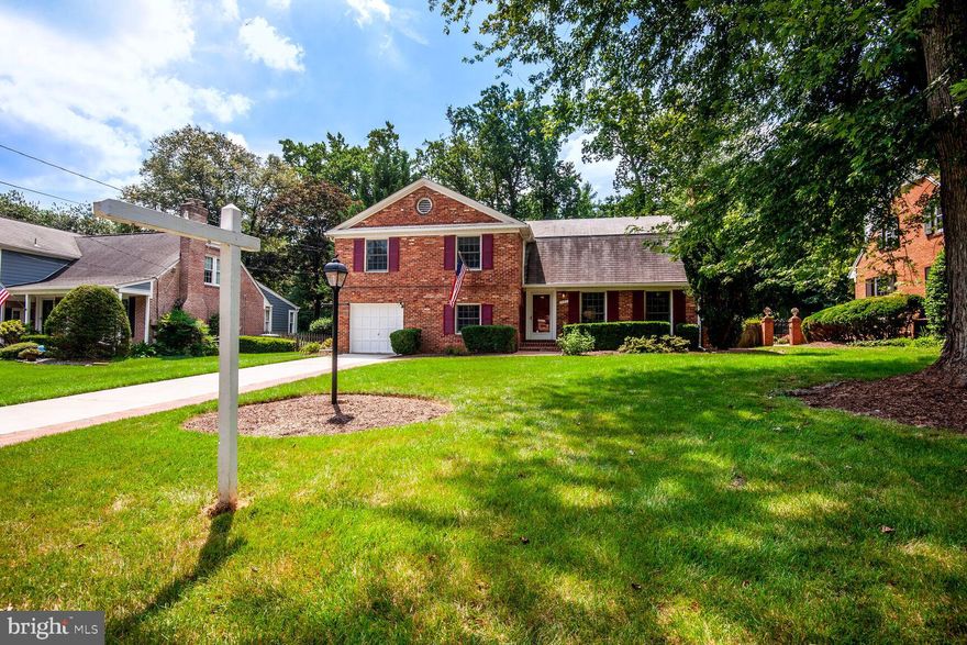 This charming multi-level Falls Hill home offers lots of living space indoors and a large, fully-fenced, backyard with brick patio, perfect for outdoor living as well.  The back gate opens to the W&OD walk/bike trail!  With 4 bedrooms, 2 bonus rooms, 2.5 bathrooms, and a clean, unfinished basement, new owners can put their mark on this well-kept home.  Nearly $45K spent in pre-sale preparations!  The interior has been freshly painted, top to bottom.  The kitchen has SS appliances with gas cooking, new ceramic tile flooring, grantite countertops & direct access to patio.  New carpet in the lower rec room/bonus room level.  Hardwood floors, vintage charm and a fabulous dining room with statement wallpaper and a gorgeous Waterford Crystal Chandelier.  2 fireplaces (1 gas/1 woodburning).  Located near major highways and shopping, you'll appreciate the convenient location while enjoying the peace and quiet of this close-knit community.  Poplar Heights Recreation Association is a nearby private swim & tennis club and neighborhood treasure.