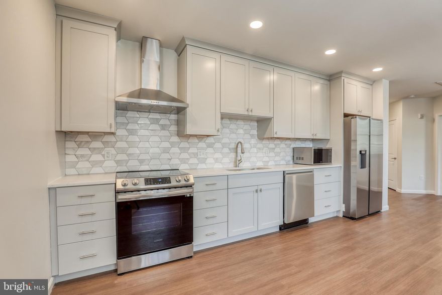 This two bedroom and two bath apartment has lots of natural light with windows spanning two sides of the building (window treatments already installed). The convenient location is just two blocks from the old town walking mall! Easy to clean and maintain LVP flooring has been installed throughout. The kitchen features ample cabinet space with plenty of drawers for easy organizing, and stainless appliances. The living area is complete with a 77" 4K smart TV, the building has closed circuit video security, with easy app access for residents. The historic Winchester Star building has been renovated for luxury living that includes private parking (2 assigned spaces included), a rarity downtown. There is an additional small storage space for bikes and such indoors. Grab your coffee at Vibrissa in the morning (next door), head back to enjoy the firepit at night or live music, or stroll just minutes to all of the shops and restaurants on the walking mall! Heat, water, and trash are included, tenants pay for their own Internet and electric service. Glo Fiber has been installed in the building.