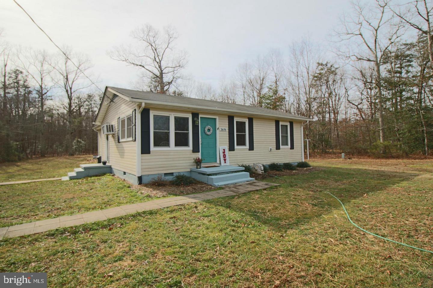 Updated rambler on a cleared acre close to shopping/schools! Upgrades include 18x18 tile, Pella Windows! Brushed nickel fixtures! Washer/Dryer convey. Shed/office finished with electric and pull-down ladder storage above- perfect man cave! USDA Financing Eligible! 1 acre lot with huge potential. No HOA. New Roof.