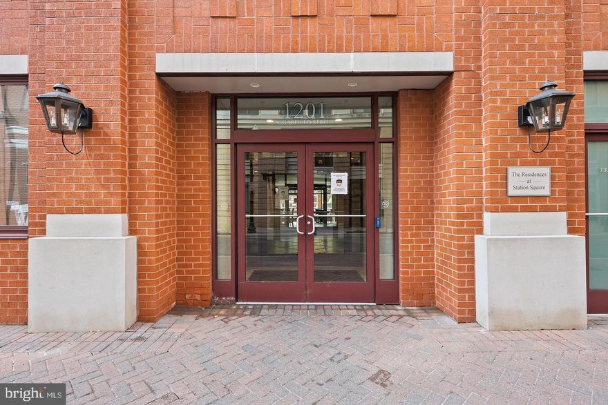 This stunning corner unit condo is loaded with updates -- 2 spacious bedrooms, 2.5 baths, and 2 assigned garage parking spaces. Beautiful hardwood floors and custom paint throughout. The gourmet kitchen includes granite countertops, sleek cabinetry, a custom tile backsplash, and stainless steel appliances. The main living space has a large living room, separate dining area, powder room and tons of windows.  Generous sized bedrooms include remote-controlled blinds and ensuite baths. Additional highlights include a full-size washer and dryer and ample storage. Situated in the vibrant Clarendon neighborhood, this home is a walker's paradise. Trader Joe's is directly across the street and Whole Foods just a few blocks away as well as many diverse dining and shopping options. With the Clarendon Metro station only a block away, commuting is effortless. There is a Gold’s Gym in the adjacent building, and nearby parks include Rocky Run Park and Lyon Village Park. This location perfectly blends urban convenience with neighborhood charm, making it an ideal place to call home.