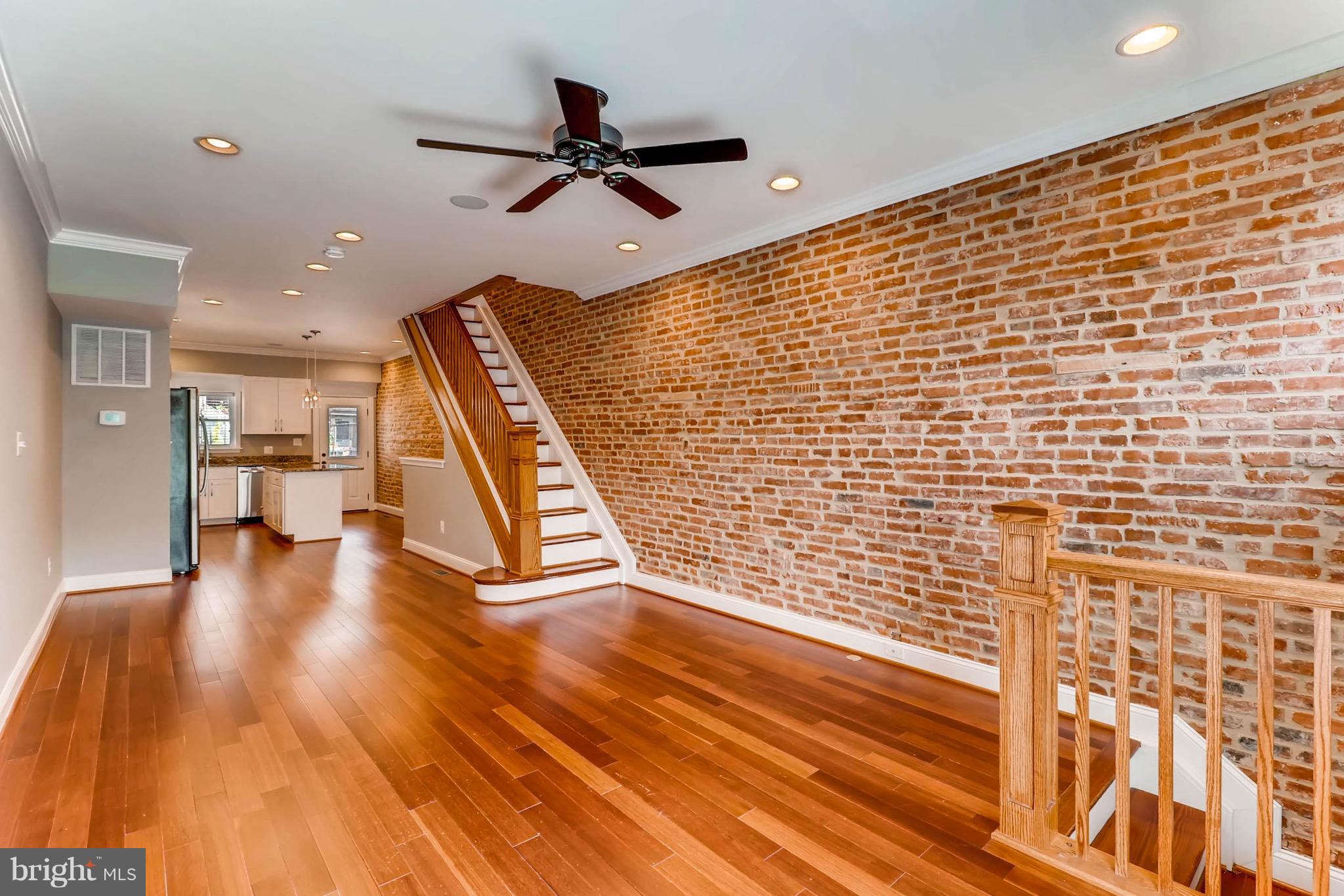 Building Character renovation only 3 years young w/estimated 7 years of CHAP tax credit!4 BR home w/parking offers open floor plan w/gourmet kitchen,sound system,roof deck,high ceilings,all in immaculate condition.This is a great opportunity for buyers that desire roommates,or investor looking for rental income.Master has dual closets & transoms,plus wood floors on main & upper levels. EZ to show!