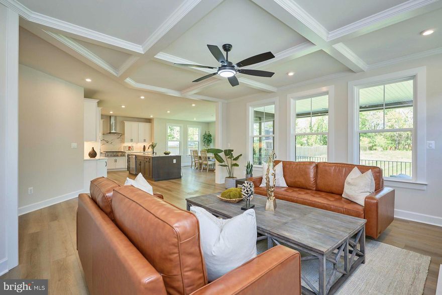 Nestled in the charming Charles W Lee Sr Estates, this stunning Craftsman-style home, built in 2026, offers a perfect blend of modern elegance and cozy comfort. With 6 spacious bedrooms and 5 luxurious bathrooms, this residence is designed to accommodate both relaxation and entertaining. Step inside to discover a beautifully finished interior, where natural light dances through large windows, illuminating the inviting living spaces. The heart of the home features a warm fireplace, perfect for cozy evenings spent with loved ones. The fully finished basement adds versatility, providing ample space for a home theater, gym, or play area, complete with convenient interior and outside access. The expansive 0.47-acre lot offers plenty of room for outdoor activities, while the thoughtful layout ensures privacy and tranquility. Enjoy the convenience of nearby public transportation, with a bus stop less than a mile away and a metro station just a short drive, making commuting a breeze. This home is not just a place to live; it’s a sanctuary where memories are made. Experience the perfect blend of comfort, style, and functionality in a community that feels like home. Don’t miss the opportunity to make this exquisite property your own!