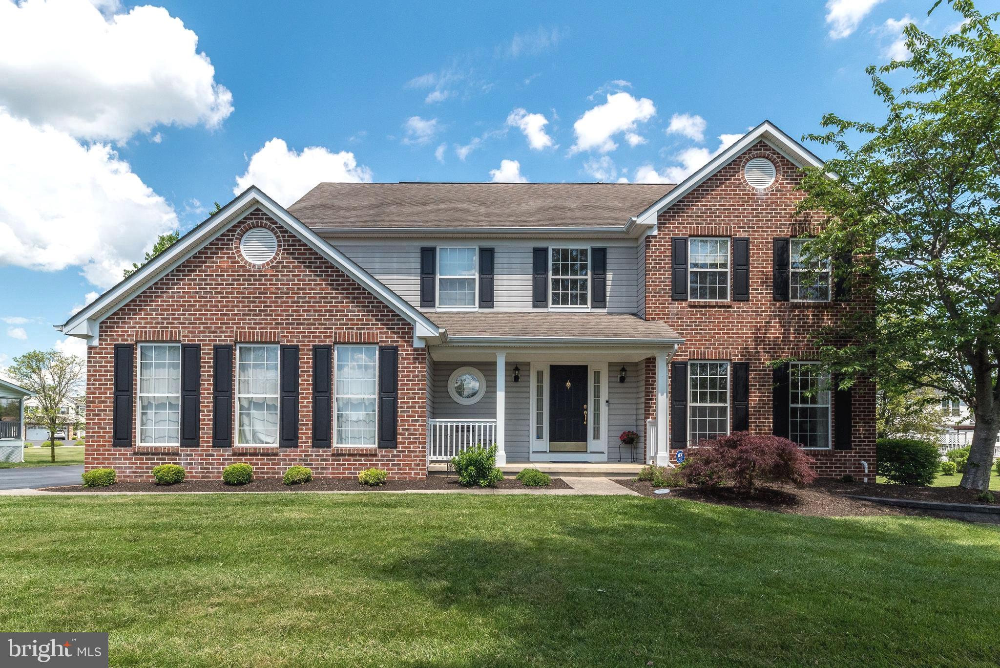 Welcome to 1590 Candace Lane – a timeless Colonial gem tucked within the Makefield Crossing neighborhood of Yardley. This beautifully maintained brick and siding residence sits on a picture-perfect lot with mature trees, manicured shrubs, and meticulously landscaped lawns, creating a truly serene and inviting setting. Step through the charming covered entryway into a warm and welcoming foyer, where gleaming hardwood floors greet you. A convenient coat closet is located just to your left, while to your right, an expansive living room awaits. Bathed in natural light from two floor-to-ceiling windows, this space features elegant crown molding, rich engineered hardwood flooring, and detailed trim work that adds a sophisticated touch. Just beyond the living room is a formal dining room that continues the same refined details—crown molding, stylish flooring, and effortless flow—making it ideal for hosting dinner parties or holiday gatherings. The dining room opens seamlessly into the heart of the home: a beautifully appointed eat-in kitchen. Here, you'll find hardwood flooring, a striking dark wood center island, granite countertops, stainless steel appliances, recessed lighting, and a pantry. A dedicated coffee station and generous cabinetry offer both style and functionality, while an exterior door leads directly to your backyard deck, perfect for morning coffee or evening meals al fresco. Step down into the cozy sunken family room, where plush wall-to-wall carpeting, backyard views, and a stunning fireplace invite you to relax and unwind. A stylish powder room and a convenient laundry area complete the main level. Upstairs, four spacious bedrooms provide comfortable retreats for all. The luxurious primary suite is a true sanctuary, boasting oversized windows, soft carpeting, a private sitting area, and a spa-inspired en suite bath with dual vanities, a walk-in shower, and a freestanding soaking tub—the perfect escape after a long day. The remaining three bedrooms are generously sized and share a well-appointed hall bathroom with dual sinks and a tub-shower combo. The partially finished full basement offers incredible versatility—ideal for a second family room, home gym, play area, or private home office, all while maintaining ample space for storage. Step outdoors and enjoy summer barbecues on your deck and soak up the sun in your expansive backyard, offering endless potential for recreation, relaxation, or creating the backyard oasis of your dreams. New Primary Bathroom 2025, new carpeting 2025, Gas heating and cooking. Award-winning Pennsbury Schools. Ideally located, this home is within walking distance to the Edgewood Village Shopping Center with local restaurants and markets. Conveniently located with proximity to I-295 and the I-95 corridor for seamless travel to Princeton, Philadelphia, and New York. 1590 Candace Lane is a great place to call HOME! FYI - Ring Doorbell at Property.