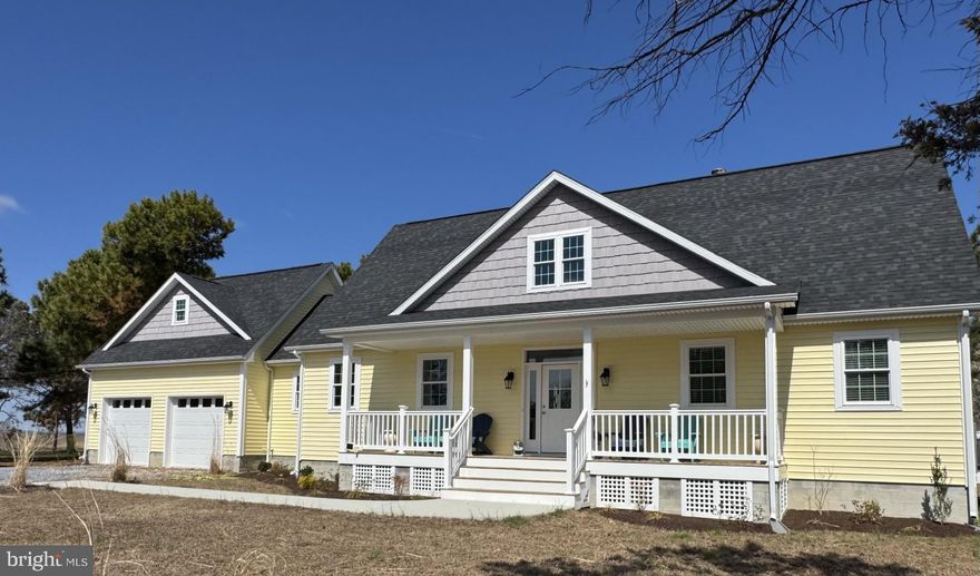 Discover this stunning, custom-built waterfront Cape Cod nestled in Ferry Cove, Sherwood, a serene setting that is located right next door to a HGTV dream home!  Newly constructed in 2024, this home offers the ultimate blend of luxury and comfort. Owners enjoy direct access to a beautiful sandy beach with 186 feet of waterfrontage on the Chesapeake Bay, creating the perfect space for both relaxation and entertaining guests. Step into the modern kitchen, which features ample storage, an oversized island, and an eye-catching glass backsplash. The open floor plan is designed for seamless entertaining, while a cozy fireplace provides warmth and ambiance on chilly evenings.
The main level primary suite boasts breathtaking water views and an owner's suite that is sure to impress. Upstairs, a spacious loft opens to a second balcony deck that overlooks Ferry Cove—perfect for watching sunsets on warm evenings. Each of the two bedrooms includes a private bath, and the second room features a large bonus room situated above the oversized two-car garage. This flexible space offers numerous possibilities to suit your lifestyle needs.
Set on over 5.5 acres, the property delivers privacy, water access, and the luxury of your own private sandy beach. There is also plenty of space for storage for your hobbies with a 36x42 pole barn added to the property in 2025.
Experience modern amenities and an inviting coastal lifestyle in this exceptional retreat. Whether you seek a year-round residence or a getaway, this property offers an idyllic setting to enjoy the best of waterfront living.