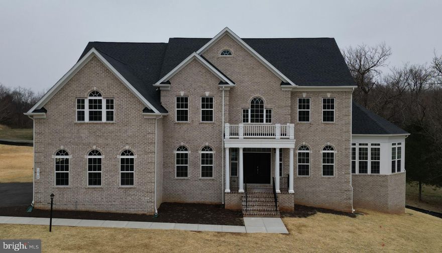 QUICK DELIVERY!  FEBRUARY 2023  MOVE-IN!  Williamsburg Homes at McCann Farms in Woodbine in Howard County offers an extraordinary setting with forest conservation and lush, 3+-acre homesites that is perfect for your dream home.  The Dorchester IV with t 3-Car Side Entry Garage has it all! This is an impressive estate home with a multitude of included options. Entertaining in the Formal Living and Dining Room areas is complemented by a well-appointed Eat-In Gourmet Kitchen featuring an attractive angled Island, Breakfast Area, level 4 white cabinetry, stone countertops, and a decorative backsplash. An extended Two-Story Family Room,  private Library, Conservatory addition, and Full Bath in lieu of the Powder Room complete the Main Level.  Upstairs you will find four spacious Bedrooms and 3 Full Baths including the Primary Bedroom complete with a grand size walk-in closet, a luxury spa Bath, and a convenient Laundry Room with cabinetry for convenience. The finished walkout Lower Level Recreation Room provides added entertaining space and includes a Full Bath. Additional upgrades include flooring, and cabinetry,  throughout  Call today! Selling off-site.