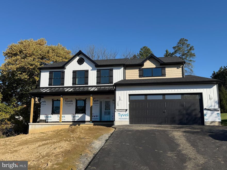 ***PRICE REDUCED & READY FOR IMMEDIATE DELIVERY!!! *** Builder is offering to Qualified Buyers, up to 2% of the purchase price ($11698.00) to buy down their interest rate or for closing cost assistance! Contact listing agent for more details. Introducing the Omega Builder's Expanded Countryshire II! This 4 bedroom, 2.5 bath single family home, now has an additional 232 square feet added to the owner's suite, giving it more bedroom space, a larger walk-in closet, and a larger owners bath, that will now accommodate a larger walk-in shower and a free-standing vessel soaking tub that everyone is looking for today. The home boasts a larger, 5 foot deep, covered country style front porch, and top quality 2"X6" construction with Viwinco Double Hung Thermal Pained windows and doors, with the builder's upgraded insulation package, making this home an extremely efficient home to operate.  The home has a partially finished basement, with an additional storage room under the covered front porch, that could easily become a temperature-controlled wine cellar or gun safe, a front entry two car garage, an over-sized mud room and main level laundry, and a spacious Trex style deck off, of the kitchen area sliding glass doors. This is an awesome lot within the Wilson School district and Lower Heidelberg Township, with some of the lowest taxes in Berks County. This home is served with public water and public sewer, and a super-efficient propane gas HVAC system. The builder is also adding a custom-built "mudroom style" landing station, with a large bench, boot lockers below, and coat hooks above. The basement is also being completely studded out, and will be made ready for drywall, flooring, and a drop ceiling, adding an additional 900 square feet of living space to this home. Catch the builder now, and he can customize that lower-level space for you!!!