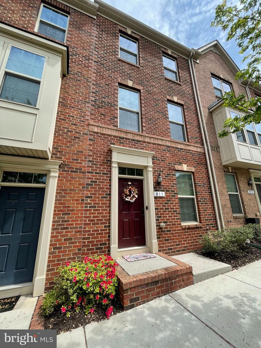 Immaculately maintained home in the heart of vibrant O'Donnell Square! Enjoy the flexibility of a lower-level den or office with a convenient half bath and direct access to an oversized garage and full parking pad. The main level features gleaming hardwood floors, a gourmet kitchen, and open-concept living and dining areas that extend to a spacious, maintenance-free deck—perfect for entertaining or relaxing. Upstairs, two generously sized bedrooms offer ample closet space, with one featuring a private en-suite bath and the other with easy access to a hall bath. All just minutes from luxury shopping, dining, local hotspots, and major commuter routes. The community also offers beautifully landscaped courtyards and plenty of green space.