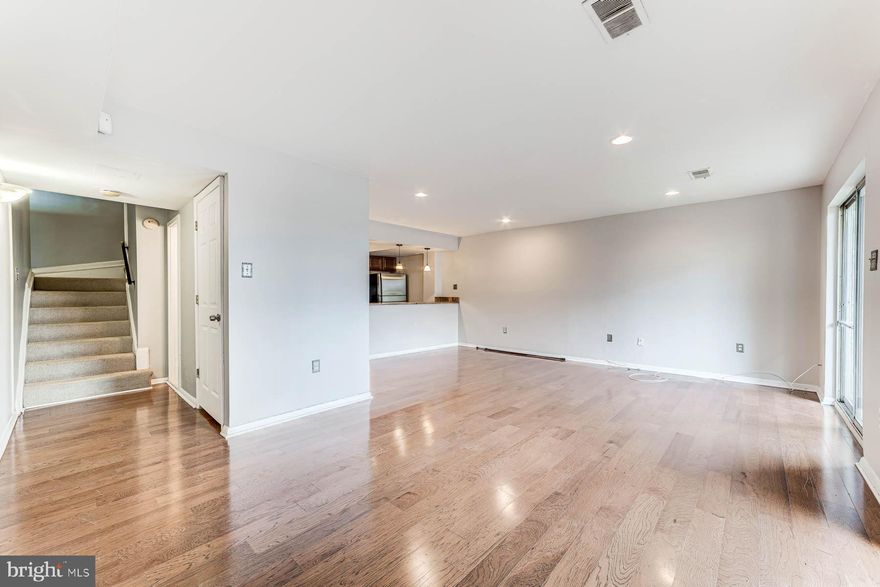 Nestled up on a hill, this quiet residence has privacy and tranquility with sweeping views of Alexandria. Upstairs has balconies off both bedrooms, hardwood floors, full bath, and a laundry room with a full sized washer and dryer. The master bedroom has a walk-in closet.  Downstairs offers an open floor plan, breakfast bar, granite counters, stainless steel appliances, hardwoods floors, a half bath, and patio. The unit has numerous closets for storage, dedicated parking, a large swimming pool, and tennis courts. Conveniently located near all major bases (Fort Belvoir, Pentagon, Suitland, JBAB, Andrews, etc) and just a minute's drive to 495.  Rent is $1900 month, $1000 deposit and includes all utilities except internet and cable. Pets are allowed. No breed restrictions. In lieu of pet rent, carpet on stairs and upper hallways is required to be professionally cleaned and deodorized.   Non-refundable  include $30 application fee per person over 18 and a $150 move-in fee.