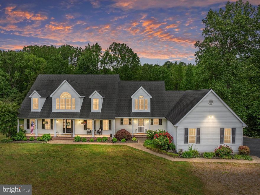 Open House is canceled due to contracts coming in!Come sit an RELAX on the huge front porch in this Remodeled Picturesque Custom Cape Cod.  This is the PERFECT Family HOME!  The minute you step inside this Magnolia Home-Farmhouse inspired Cape Cod, you feel at home! Amazing location minutes to Edgewater and 10 min Annapolis shopping, 40min to Baltimore and DC.  This home features an amazing floor plan with a 1st floor primary suite w/ a gorgeous remodeled bathroom w/ double vanity, soaking tub and separate shower w/porcelain  tile.  So many amenities in this Custom Cape to include a "To Die For" newly remodeled Gourmet kitchen w/ Double islands, Stainless steel appliances, Quartz countertops, marble backsplash, a butler's pantry and new hardwood floors.  Steps from kitchen is an New "One of a Kind" Bar Room  with beverage & wine fridges and brick Herringbone floors, this is the perfect entertaining space!  Beautiful covered porch off kitchen, leads to a maintenance free deck overlooking huge private wooded backyard.  Oversized family room off kitchen w/hardwood floors, custom woodwork and a natural stone fireplace.  Completing the downstairs is two story Foyer, Separate Dining room , Laundry Room and Mud Room . DUAL STAIRCASES lead upstairs to the 5 Bedrooms and a newly remodeled bath with double sinks ,separate shower and  an newly built out office space-great for the work from home lifestyle.  Upstairs has loads of storage  to include custom shelving, window seat w/storage, walk-in closets an a storage area of almost 1k square feet which could easily be converted to more living space.  This home has so much space to offer: to include 3 car garage, unfinished walk-out basement( to finish to your liking).  All this on a 3.85 acre lot surrounding rolling Farmland. Bring your farm animals!! THIS HOME is a MUST SEE!!
