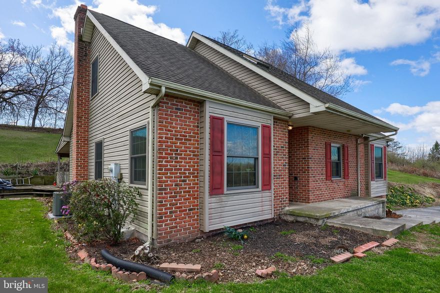 Are you looking for a nice home in a rural setting on over 4 acres with a sizable detached 2 car garage and barn for a horse. Home features a first-floor owners suite with 3 additional bedrooms, the 4th bedroom is in the walk out lower level.  Lower level has an integral garage, with a large utility room and a bonus room.
Laundry on 1st level, 1/2-bathroom, formal dining room, large kitchen with plenty of cabinets. Second level features 2 bedrooms, bathroom, and don't forget to check out the Walkin large storage area that covers the rear length of the home. With a little effort this will make a great home
Home has had recent improvements; Renewal by Anderson Windows, Air condition, roof, hot water 
heater.