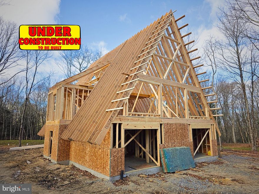 The Investor's Dream - Modern A-Frame Vacation Home, designed and built by the Poconos leading A-frame builder. This 3400 sq ft home makes for an elegant vacation home or rental. It features 6 bedrooms, including 2 suites and 3.5 baths. The custom kitchen features upgraded appliances, quartz countertops, and an eating island that seats 14. The large great room has a cathedral ceiling, stone fireplace, and lots of natural sunlight that opens to a large deck and a smaller coffee deck. The lower level, perfect for billiards or man cave, also has a large stone fireplace and stone and granite bar, and opens out to a stamped concrete patio on an acre of property. Super high-efficiency zoned heating and cooling, standing seam metal roof, and triangle snowflake windows shine light on the exceptionalism of this home. Seller has a working relationship with PA licensed real estate agent and builder. Call the listing agent for this or similar new construction opportunities in the Poconos. UNDER CONSTRUCTION: Currently framed and under roof.