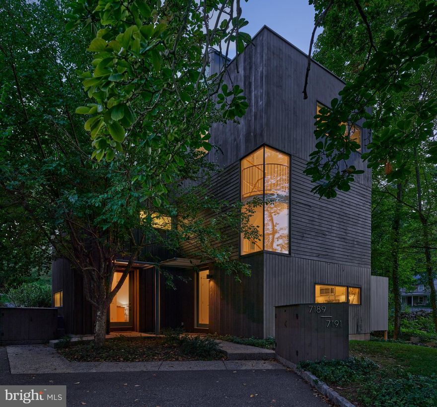 Sophistication in Center Bridge --this truly unique contemporary duplex designed by world-renowned architect J.  Robert Hillier, is guaranteed to satisfy the most discerning investor.   Located minutes from New Hope, Peddlers View, Stockton and Lambertville, this contemporary home is designed to be a wonderful full-time or part-time home.  Each unit has a soaring living space with a gas fireplace, window walls to a private patio, with woods and a stream beyond.  The rooms are overflowing with natural light. Bamboo floors throughout add to the light, clean look of all the spaces. Kitchens and baths are beautifully appointed, bright and airy with timeless finishes. Good closet space, upgraded appliances, granite counters and to top it all off an elevator in each unit with access to all three floors!  There are several possibilities: live in one, rent one or rent both. Open them up to create a one-of-a-kind single-family, or condo the units 
and sell one or both.   This is a wonderful opportunity for the savvy investor.  It's time to make your move to New Hope....enjoy the good life!