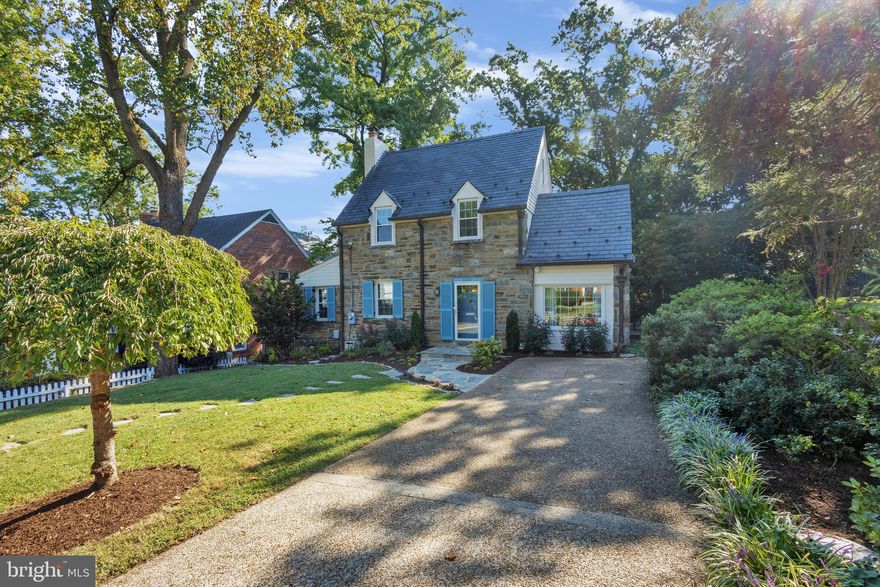 Quintessential Belle Haven colonial offers 4 bedrooms, 3 full baths, 3 finished levels and off-street parking within walking distance to Belle Haven Country Club. This beautiful home features thoughtful upgrades throughout, including newer windows, hardwood floors and an open and inviting floor plan. The recently renovated kitchen has a large farmhouse sink, quartz countertops, stainless steel appliances and an abundance of beautiful white cabinets. The living room is warm and welcoming with a wood burning fireplace and custom crafted built-ins. Upstairs you will find 3 spacious bedrooms, one with a balcony overlooking the backyard, and each with generous closet space. An updated full bath completes this level. The Main level 4th bedroom with an en-suite bath can also be used as a home office or family room. The fully finished lower level is where you will find the recreation room, an additional full bath, the laundry room, ample storage, and a new tankless heating system. From the charming main level sunroom, make your way to the private, flat backyard oasis with mature trees, lush plantings, and room for future expansion. Belle Haven is a sought-after neighborhood just minutes to Old Town Alexandria and the Potomac River. It is conveniently located near major commuter routes, a metro station, Reagan National Airport and Washington DC.