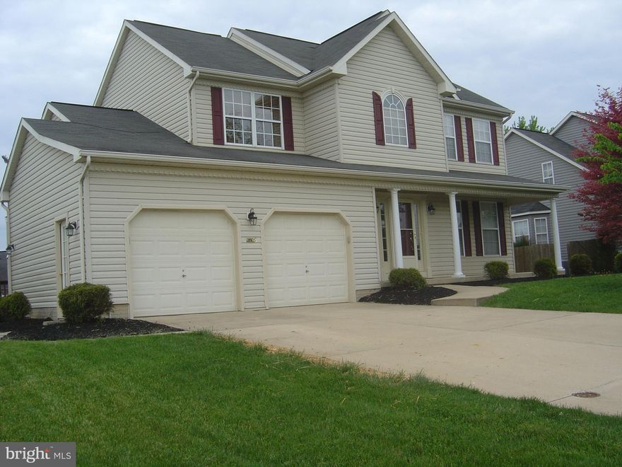 Over 2800 Sq' Shows like new this 5 Br 3 FB colonial  9' ceilings on first floor 2 story open foyer, Hardwood in foyer, dinning room, living room. Gas fireplace, Granite counters with 42" wall cabinets and Stainless Appliances, Finished Basement with full bath and office,  and walkout. Screened Porch with deck and above ground pool. Freshly painted and new carpet, Covered Front porch, 2 car garage