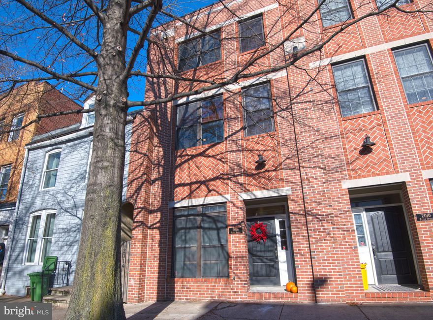 So much to love about this GARAGE townhome nestled right between Fells Point and Canton, and convenient to everything! Light filled and WIDE with three generously sized bedrooms. Owners have made loads of upgrades since purchasing in 2015.   They've added a half bath on the ground level and renovated all other bathrooms. Check out the spa-like master bath! Neutral paint throughout. Kitchen cabinets refinished in white, and brand new carpeting installed prior to listing. Garage painted and re-floored. New fixtures throughout, etc. etc.  There's an extra parking space outside the garage. Water and city views for days from the gorgeous rooftop. And it's a totally SMART house, including security system, camera, door locking and HVAC all controlled right from your phone. Small HOA fee takes care of snow removal, power washing and minor exterior maintenance. Walk to countless restaurants, cafes, supermarkets and more from your perfectly located home sweet home!