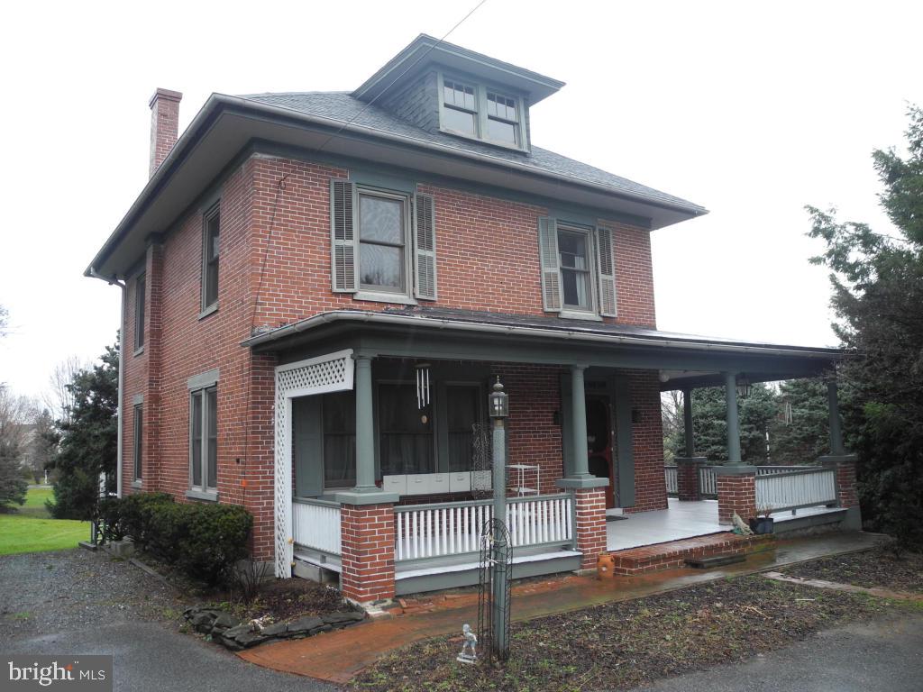 Amazing character and charm thru-out! Great location with over 1/2 acre of land; Beautiful gourmet kitchen w/breakfast nook; separate dining room & roomy living room; 3 large size bedrooms; first floor laundry rm & Bath; Newer electric, plumbing, double pane windows; 200 amp service; Deep window sills; Large storage shed/outbuilding-great storage or potential garage; washer, dryer, refrig included