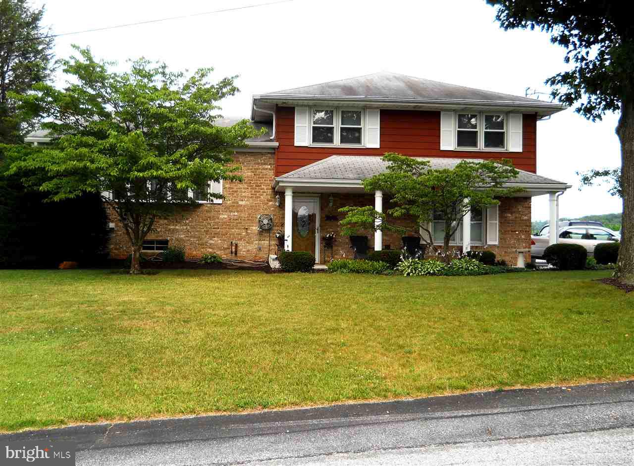 DELUXE COUNTRY LIVING. RELAX ON THE REAR DECK & ENJOY THE BEAUTIFUL SETTING OF AN INGROUND POOL & MANICURED LAWN SURROUNDED BY FARMLAND. SPACIOUS KITCHEN W/PLENTY OF CABINETS & TILED FLOORS, LUXURY SIZED MASTER BDRM W/2 CLOSETS, WALKOUT FAMILY ROOM IS HIGHLIGHTED BY BRICK FIREPLACE, 15X20 GUEST ROOM HAS ITS OWN BATH & SEPARATE ENTRANCE.