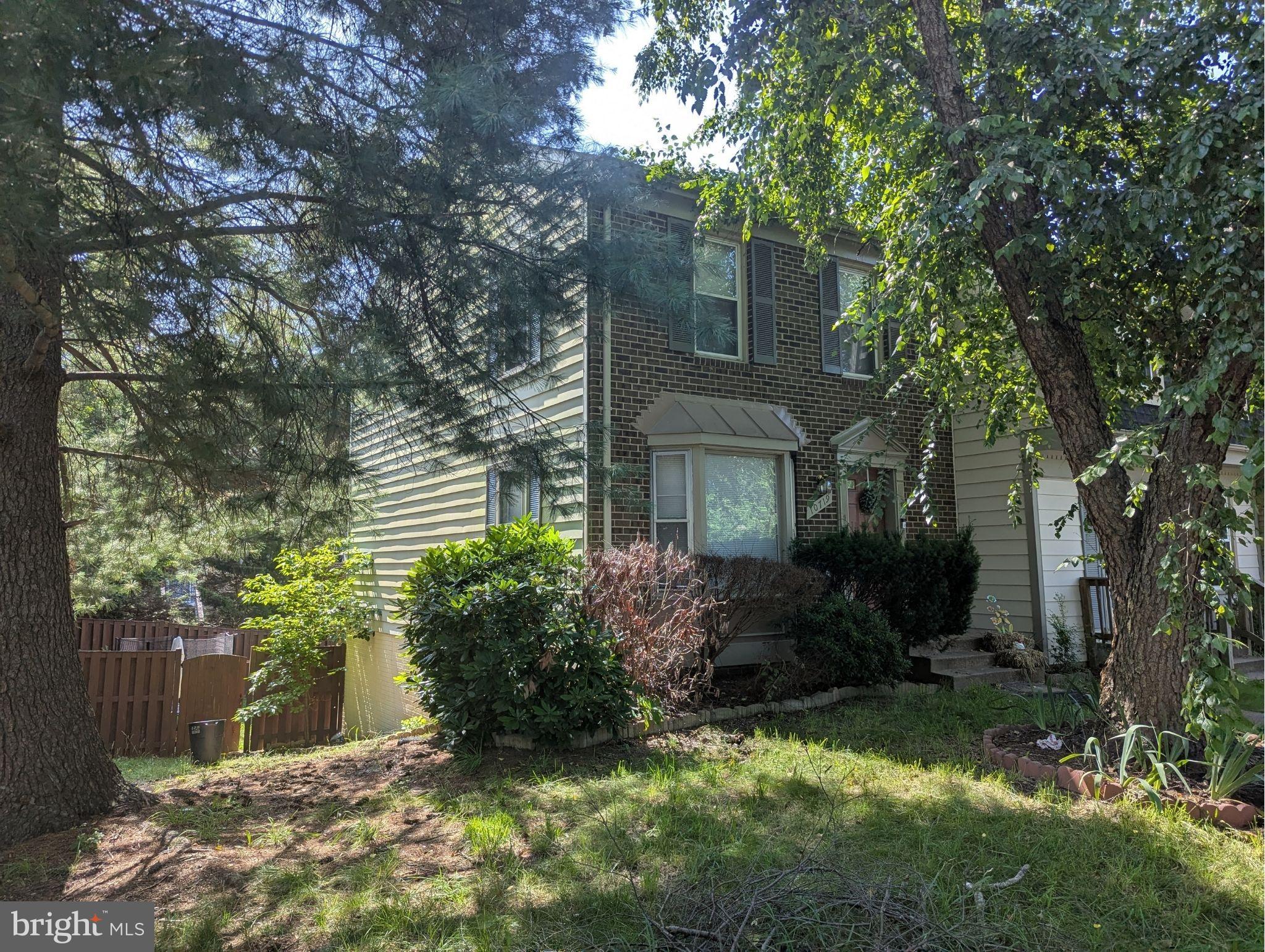 Charming brick front-end unit townhome features newer stainless steel appliances, including a newer washer and dryer, newer flooring, and stunning neutral decor. Oversized rooms, fully finished walk-out basement, walk-in closet, deck, and fully fenced-in yard, assigned parking right outside your front door. Located just minutes from I-95, schools, shopping, and restaurants.