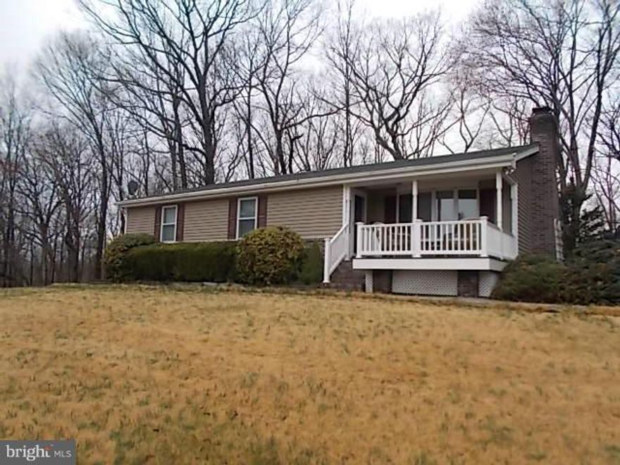 CARROLL COUNTY...1ST TIME OFFERED...BEAUTIFUL & PRIVATE 13.42 ACRES W/RANCHER HOME (MODULAR) W/3 BEDROOMS & 2 BATHS, 1ST FLR FAM RM W/BRICK FIREPLACE PLUS FINISHED GREAT ROOM W/WOODSTOVE IN LOWER LEVEL*20' FEE SIMPLE STRIP ACCESS INTO PROPERTY; CIRCULAR DRIVE, WELL & SEPTIC* ANDERSEN  WINDOWS*KITCHEN TOTALLY RENOVATED W/GRANITE COUNTER TOPS & STAINLESS STEEL APPLIANCES*