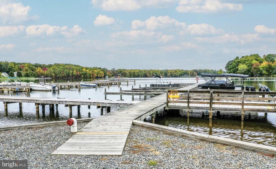 Beautiful Lake Anna water access lot with an assigned boat slip located on the private side of the lake in Jerdone Island subdivision.  This .964 acre lot is adjacent to a great non-navigable cove that is perfect for the outdoor enthusiast that loves fishing, canoeing and kayaking.  Recent soil work completed for a 4 bedroom septic system.  Take a ride down to the neighborhood waterfront common area where you will enjoy your own assigned boat slip, picnic gazebo, sandy beach and boat ramp to enjoy a variety of water activities, from boating and fishing to swimming and picnicking at the community's common area. This lot will ensure a lifestyle filled with, adventure, relaxation and outdoor enjoyment.  Whether you're building your full time home or lake retreat, Lake Anna is the perfect place for it.  Just bring your builder and house plans! Jerdone Island is a golf cart friendly community!