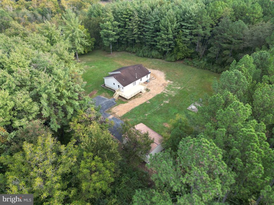 Home on acreage, newly renovated, secluded, one remaining DUR, and nearly 4,000 feet of Opeqoun Creek Frontage. Has this property checked all the boxes yet?

Upon entering the property you will notice a well maintained gravel driveway that offers ease of access directly to the home. Just off of Old Winchester Road is a gate securing the property that could easily be converted to an electronic or automatic opening gate. Traveling down the driveway just before you make your away around the ridge you are met with a phenomenal view of a small field graced with 2 large oaks just off the drive. This field could easily be converted into a manicured arena or grazing area for livestock. Once you reach the top of the ridge you will find this elegant home perched on the hill crest overlooking the field below and hidden with the tall pines surrounding the yard.

Immediately you will see fresh landscaping and a brand new deck installed within the past 30 days. Just off the home is a large two car detached garage with electric offering space for storage and additional parking. A large yard encompasses the home giving you just enough room to enjoy but not too much to become a hassle to mow.

The property is nothing short of spectacular and riddled with walking/atv trails that travel to all corners. Along the western edge sits a small clearing where the creek can be heard from the ridge and views can be seen through the trees. Along the creek there are tracks from the local wildlife that frequent the property including deer, turkey, and waterfowl. In some locations there are deep pools great for cooling off in the summer and rapids to sit and listen to water roll over the rocks. Traveling the trails that parallel the creek you will find old tree stands where previous hunters had successfully harvested deer during seasons past. 

Leave no doubt that this property is setup to be a forever home, family compound, or recreational escape from the city lights! 

Security cameras in use on the property.