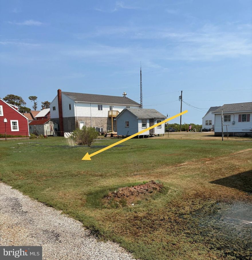 Cleared quarter-acre lot with expansive water views in the village of Tylerton, on historic Smith Island., Maryland. The property had a house on it in the past, the imprint/footprint  is clearly visible. Water and public sewer hookups are available. Buyer must do due diligence on permits. It is conveniently located near the water, dock, market, and church.