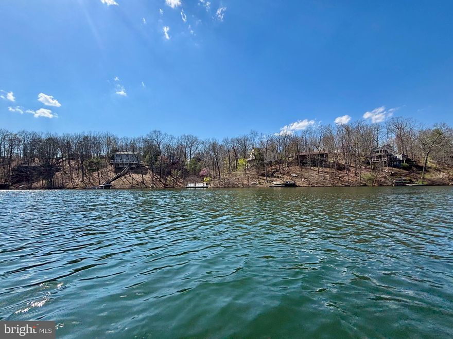 Build your dream home on this beautiful waterfront lot in the private gated community of Lake Holiday Estates. This buildable parcel offers serene lake views and direct water access, creating the perfect setting for a full-time residence or weekend retreat. Enjoy lakeside living while taking advantage of Lake Holiday’s amenities, including the 240 acre recreational lake, beaches, boating, fishing, dog park, basketball courts, tennis courts, volleyball courts, and disc golf course. With paved roads, established utilities, and an easy drive to Winchester and surrounding commuter routes, this property combines natural beauty with everyday convenience. Lake Holiday is gated. Visitors must be accompanied by a realtor in order to see the property.