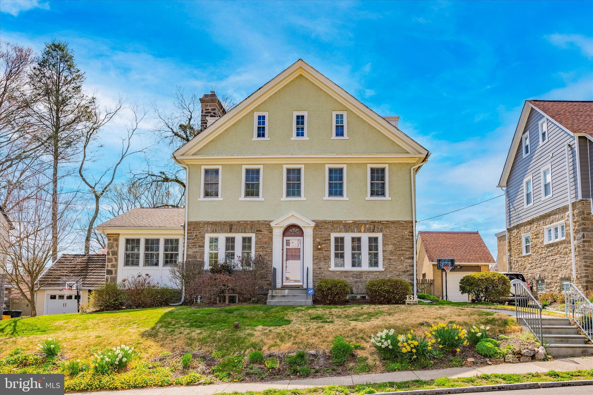 Wonderful opportunity just in time for Spring! Presenting 132 Cynwyd Rd,  a classic Bala Cynwyd stone colonial that has been meticulously maintained and restored to combine modern living with classic finishes and architecture. The curb appeal of this home is striking starting with the gorgeous stone exterior mixed with handsome stucco and flanked by mature landscaping. Solid flagstone and pavers provide a great entry path to the gorgeous Portico which provides cover as you enter through the front door. Entering into this welcoming home begins with a large and spacious Living Room with hand-cut stone fireplace (gas), recessed lighting and bamboo flooring. Off the Living Room is the enclosed sun porch space flooded with natural light and offering wonderful space for a family room, office, reading or game area. This room is fully heated and cooled through the mini-split, has a tile floor and is a warm and comfortable space. Sliding glass doors off the sun room open to a composite deck with space for a large table and umbrella and access to the rear yard. Love to cook and entertain? You'll enjoy the open kitchen/dining area which offers a beautiful and well designed open kitchen space. Fieldstone wood off-white cabinets, Quartz countertops with waterfall, subway backsplash, Peninsula with seating for 4 and high end stainless steel appliances makes cooking and hosting a dream. Don't miss the carefully designed pantry with custom cabinets, built-ins and slide-outs. A wonderfully convenient first floor Powder Room with radiant floor heating and access door to the lower level patio, all extensively hardscaped completes the first floor. Heading up to the second floor is the large primary bedroom with lots of natural light and a redesigned walk-in closet system with a beautiful solid oak barn door. The Primary has it's own access to the hall bathroom with fresh tile, bathtub and newer fixtures. Two spacious bedrooms finish out this level with lots of closets for storage. Upstairs to the third level is a large landing and recently renovated full bathroom with artisan tile flooring, new subway shower tile and good ceiling height. Two additional bedrooms on this level filled with lots of natural light and hardwood flooring. So much great interior space but even more room to entertain and enjoy on the exterior. The back exterior is completely fenced in, offers great privacy and has both a deck and a paver patio. The patio hardscaping offers a wonderful area to enjoy the outdoors with a custom built fire-pit. stone walls for sitting and is adjacent to the rear yard. Additional features of this awesome home include: a 1 car garage with upgraded loft storage, clean and dry lower level space with a Powder Room, built-in storage, upgraded mechanicals and a hookup for a generator. All of this on a quiet, leafy street in beautiful Bala Cynwyd within walking distance to the Bala train station, the shoppes on Bala Ave and the amazing Cynwyd Heritage Trail. All located in award winning Lower Merion Schools and amazing accessibility to Philadelphia by car, train and bike. Make your appointment today to see this special home!