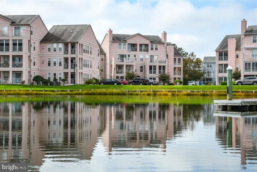 Are you ready for maintenance free coastal living?  If so, then come see this beautiful first floor, 2 Bedroom/2 Bath condo located in the well sought out Marina Village at the Ocean Pines Yacht Club and Marina!  Nestled in the heart of Ocean Pines, this condo boasts a large master bedroom with ensuite/walk-in shower with glass doors, second bedroom is across from a 2nd full bathroom, sunlit dining room with easy access to screened porch, and cozy and comfy living room with gas fireplace.  Spacious laundry room with washer, dryer and shelving.  Private large screened in porch overlooking beautiful woodlands -- not a parking lot.   Upgraded lighting and Decora electrical switches and outlets, ceiling fans, updated bathroom faucets, mirrors, shower doors, toilets and much more!  Locked storage unit  is located within feet of the front door.  Home Warranty Included!  Condo fees include both hazard & flood insurance, trash, common area and building exterior maintenance, pest control, landscaping, elevator maintenance and snow removal.  Please go to www.oceanpines.org for an entire list of what Ocean Pines has to offer!  Close to Ocean City and Assateague Beaches, Downtown Berlin, Pools, OP Beach Club, jogging, biking and walking trails and the list goes on!