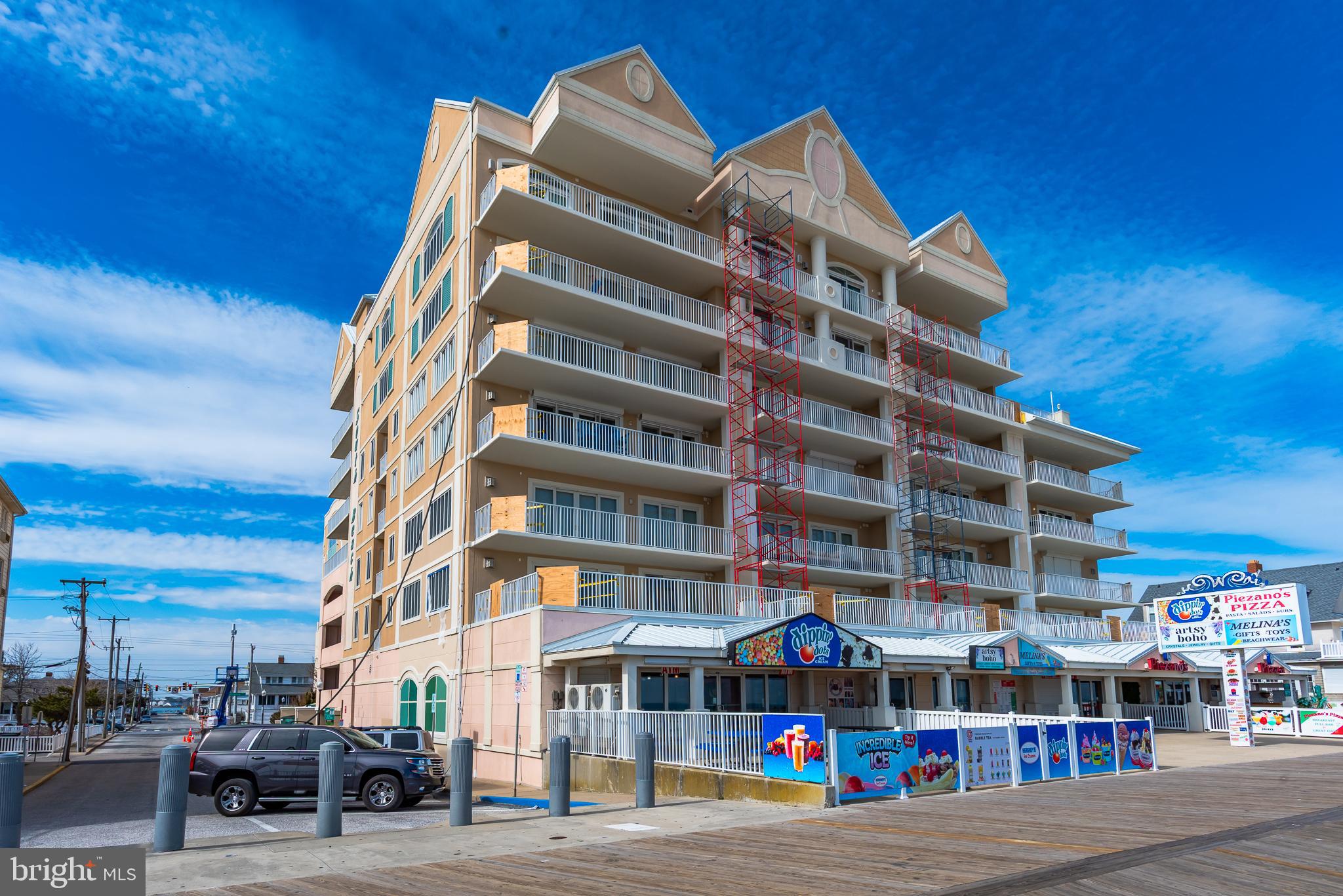 BEST DIRECT OCEAN FRONT, LUXURY CONDO DEAL ON THE BOARDWALK! Incredible direct oceanfront 3 BR, 3 bath residence located on the World Famous Boardwalk at 7th St. Enjoy wonderful ocean and beach views from living room, dining room, kitchen & oceanfront master BR. Have a seat on the balcony and enjoy the Boardwalk activity & people watch. This spacious condo offers distinctive details: granite counters, tile flooring, crown molding, laundry room, walk in closets, and gas fireplace, Amenities include indoor pool, rooftop outdoor pool, fitness center, parking garage with 2 assigned spaces (#93 and #94 on 3rd floor), secured lobby and huge owners' locker. This is the perfect location to enjoy all the excitement of downtown Ocean City, numerous restaurants, shopping and family entertainment. This condo has an excellent rental history, grossing $67,655 in 2024, and 2025 already has $48,521 on the books. 2025 rentals must be honored through Central Reservations.
