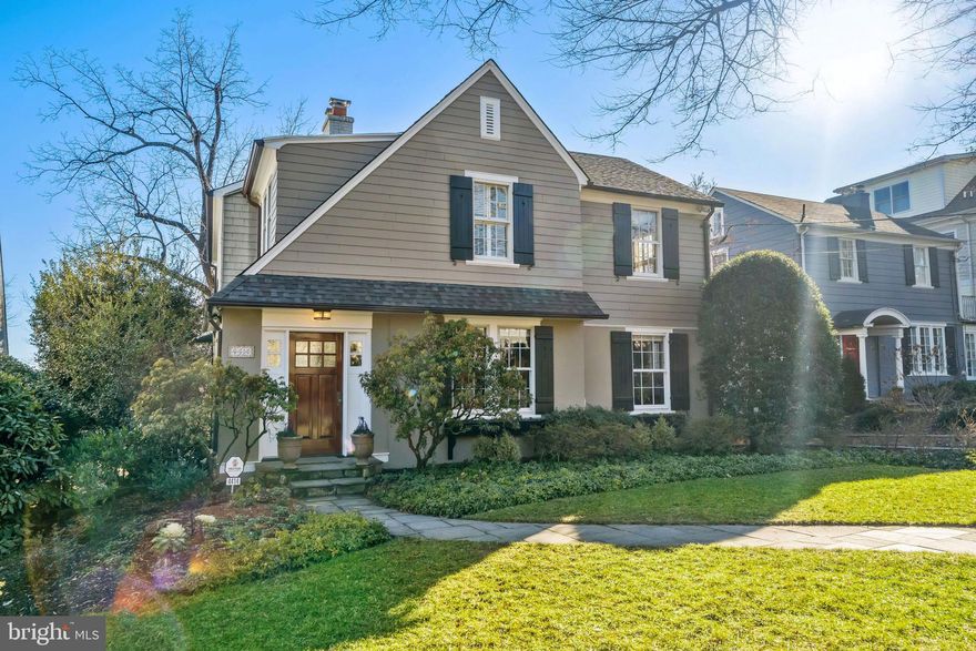 Originally developed in the early 1920's with impressive, well-built, single-family homes, Wesley Heights remains one of Northwest DC's most desirable neighborhoods.   Wesley Heights is recognized as one of the first planned communities in the United States. By design, homes were built on large, rectangular lots with a variety of materials paying close attention to details. The neighborhood has a beautiful blend of housing styles including Tudors, Colonials, bungalows, and Cape Cods. Following with this tradition, 4414 Lowell St NW is a solid Tudor style home built in 1926 on a large lot.  The home has been expanded to include 5 Bedrooms and 4.5 Baths throughout 3 finished levels, and an attic suitable to add additional living space.  A true entrance foyer leads to an open living room with custom built ins, and a large rear deck overlooking a professionally landscaped backyard with a treehouse.  The eat-in, chef's kitchen is the heart of the home, and the center island can easily accommodate 5 people. The main level also includes a half bath, formal dining room with fireplace, and a home office.  The lower level has a separate living room leading to a covered, flagstone patio and a second full bath for added convenience.  Additionally, there is a 5th bedroom with a full bath that could be used as an in-law suite.  The upper level has 4 generous sized bedrooms and 2 full baths.  The master suite has a wall of windows with pleasant views of the manicured rear yard, and a large, renovated bathroom with a double sink. The home includes a separate, detached garage that has been updated to house an electric vehicle and has a new remote door opener.   An abundance of flowering bulbs has recently been planted to provide an amazing spring bloom. In short, Wesley heights is a wonderful place to call home. The quiet, tree lined streets are conveniently located near Horace Mann Elementary, American University, Wagschals. and Chef Geoff's restaurant.  Wesley Heights offers the best of both worlds - a calming, friendly community with an easy commute to downtown DC.