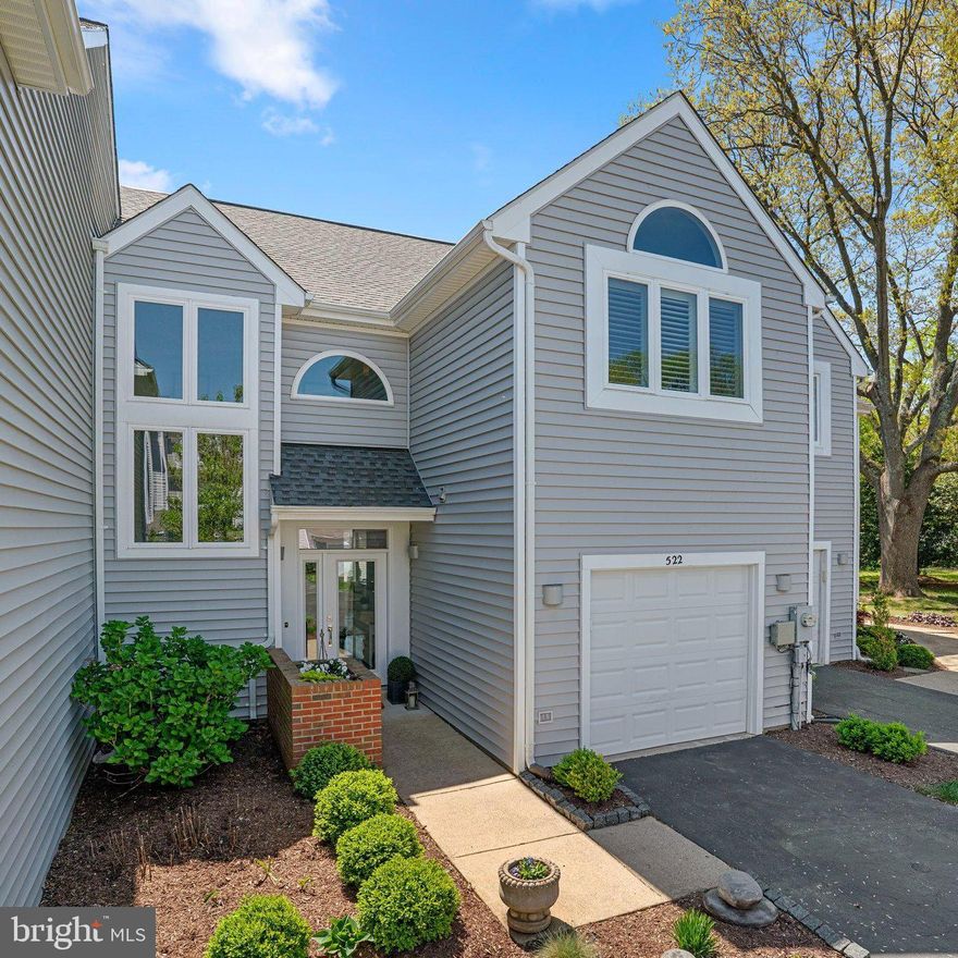 **Offer Deadline: Sunday April 27th @9pm**

Welcome home to Moorings on the Magothy! This amazing gated community with waterfront access offers a private sandy beach, dock, and tennis! Designer inspired touches throughout this amazing two bedroom two and a half bathroom garage townhome.  Fresh, neutral paint throughout, updated and fabulous designer lighting, high ceilings, hardwood floors and custom plantation shutters throughout. The kitchen is classic with white cabinetry and granite countertops, peninsula seating plus open to the dining area. Perfect patio off the kitchen is ideal for morning coffee or evening cocktails. The living room is spacious  and bright offering hardwood floors and a cozy fireplace. A newly renovated half bathroom on main level with gorgeous high end finishes.  Upstairs the primary bedroom is grand with a cathedral ceiling, sitting area, custom finished walk in closet and updated spa inspired bathroom with glass enclosed tiled shower, dual sink vanity and separate water closet. The second suite offers its own private bathroom and large closet. Bedroom level laundry room with ample storage for utmost convenience.  Ample storage throughout with great, spacious closets and the full garage.  Wonderful restaurants & marinas within walking distance.  Just a short drive to all Annapolis has to offer- shopping, dining, entertaining & more! Schedule your private tour today!