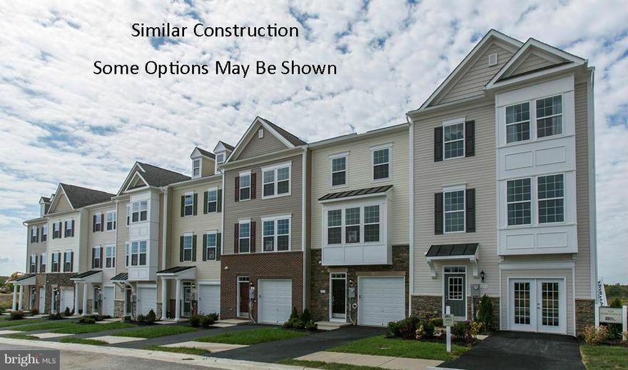 Dan Ryan Builders offers a new set of Yorktown II townhomes at Riverside Villages for summer delivery. This huge end unit has stone front detail, sunroom expanded plan for 2279 finished sq.ft. featuring oversized master suite with deluxe bath, bright & open island kitchen & sunroom area with upgrade appliances & cabinets, plus double finished spaces in walkout lower level. Every loves a garage!