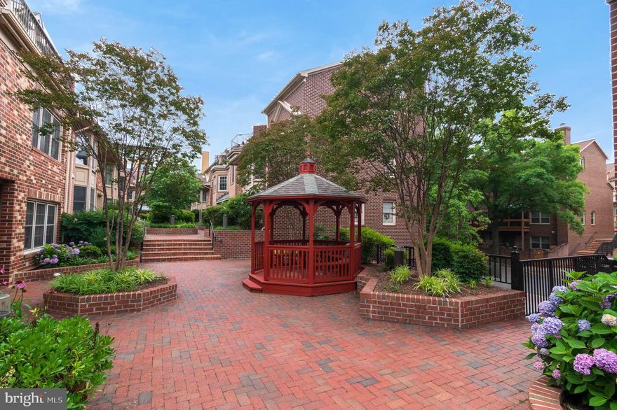 Experience the best of Ballston living at 611 N Tazewell Street—a beautifully maintained 4-level townhome tucked into one of Arlington’s most dynamic neighborhoods.

Live just moments from everything: Ballston Metro, Harris Teeter, Target, and the buzzing energy of Ballston Quarter, with its endless mix of restaurants, fitness studios, coffee shops, and nightlife. Whether you're grabbing a quick bite, commuting downtown, or meeting friends for happy hour, everything you need is just steps from your door.

Inside, this spacious home offers 3 large bedrooms, each with a private en-suite bath and custom walk-in closet—perfect for comfortable city living with room to grow. The main level features an open-concept kitchen with granite countertops, stainless steel appliances, and a breakfast bar, flowing into light-filled dining and living areas ideal for entertaining or winding down.

A versatile entry-level space offers endless potential—a home gym, office, or cozy movie den—plus direct garage access for easy convenience. The top floor is a true highlight: a private primary suite retreat with a spa-inspired bath and exclusive access to a rooftop terrace, your own slice of outdoor serenity in the city.

At 611 N Tazewell, you’re not just buying a home—you’re unlocking a lifestyle. With top-tier amenities, unbeatable convenience, and the vibrant culture of Ballston at your doorstep.

Schedule your showing today and be among the first to experience everything this exceptional home has to offer!

Square footage is approximate and should not be used for property valuation.