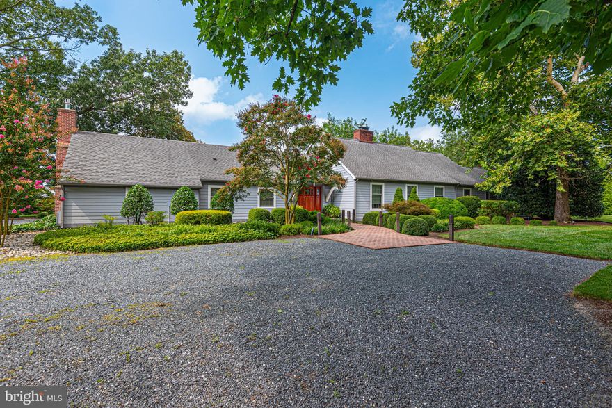 Welcome to your private Eastern Shore retreat! This amazing 4-bedroom, 4.5-bath Cape Cod is perfectly situated on a secluded peninsula, offering unparalleled tranquility and breathtaking waterfront views of Boone Creek located in beautiful Oxford, Maryland. The home offers an incredible blend of traditional elegance and modern luxury. An open and airy floor plan is bathed in natural light, with expansive windows framing the stunning water views from nearly every room. The living room has beautiful brick floors and a wood burning fireplace. You will also find a gas fireplace in the spacious family room. The bright and inviting sunroom has cathedral ceilings and walls of glass doors with water, pool, garden and patio views. The gourmet kitchen is a chef's delight, featuring high-end appliances, custom cabinetry, and a large center island. It flows effortlessly into the formal dining area which includes an additional fireplace for cozy and intimate dining experiences. Beautiful hard wood floors flow into several rooms. The main floor also hosts two private sanctuaries: an ensuite bedroom and a primary bedroom, each with private decks offering stunning water views. The primary suite's closet is a truly incredible, separate dressing room. A laundry room, a full bath, and a half bath complete the main level. Upstairs, two large bedrooms and a shared bath provide comfort and privacy for guests or family. Outside you discover a true entertainer's paradise. The property's unique peninsula location offers a wide expanse of water frontage, perfect for enjoying the Eastern Shore lifestyle. A large, sparkling in-ground pool is the centerpiece of the manicured grounds, surrounded by extensive hardscaping and lush landscaping, creating a resort-like feel. The detached two-car garage is enormous. There are raised beds in a fully fenced garden with a garden shed. The climate-controlled dock house offers endless possibilities for a gym, office, art studio or storage. The private dock provides water access for boating, kayaking, paddleboarding, fishing and crabbing on Boone Creek. With quick water access to Choptank River, Tred Avon River, Chesapeake Bay & Miles River, you can explore the best areas of the shore. This home is more than a residence; it's a lifestyle. Located just minutes from the historic town of Oxford, you'll have easy access to charming shops, restaurants, parks, the beach strand and the Oxford-Bellevue Ferry. This is a rare opportunity to own a piece of paradise on the Eastern Shore.