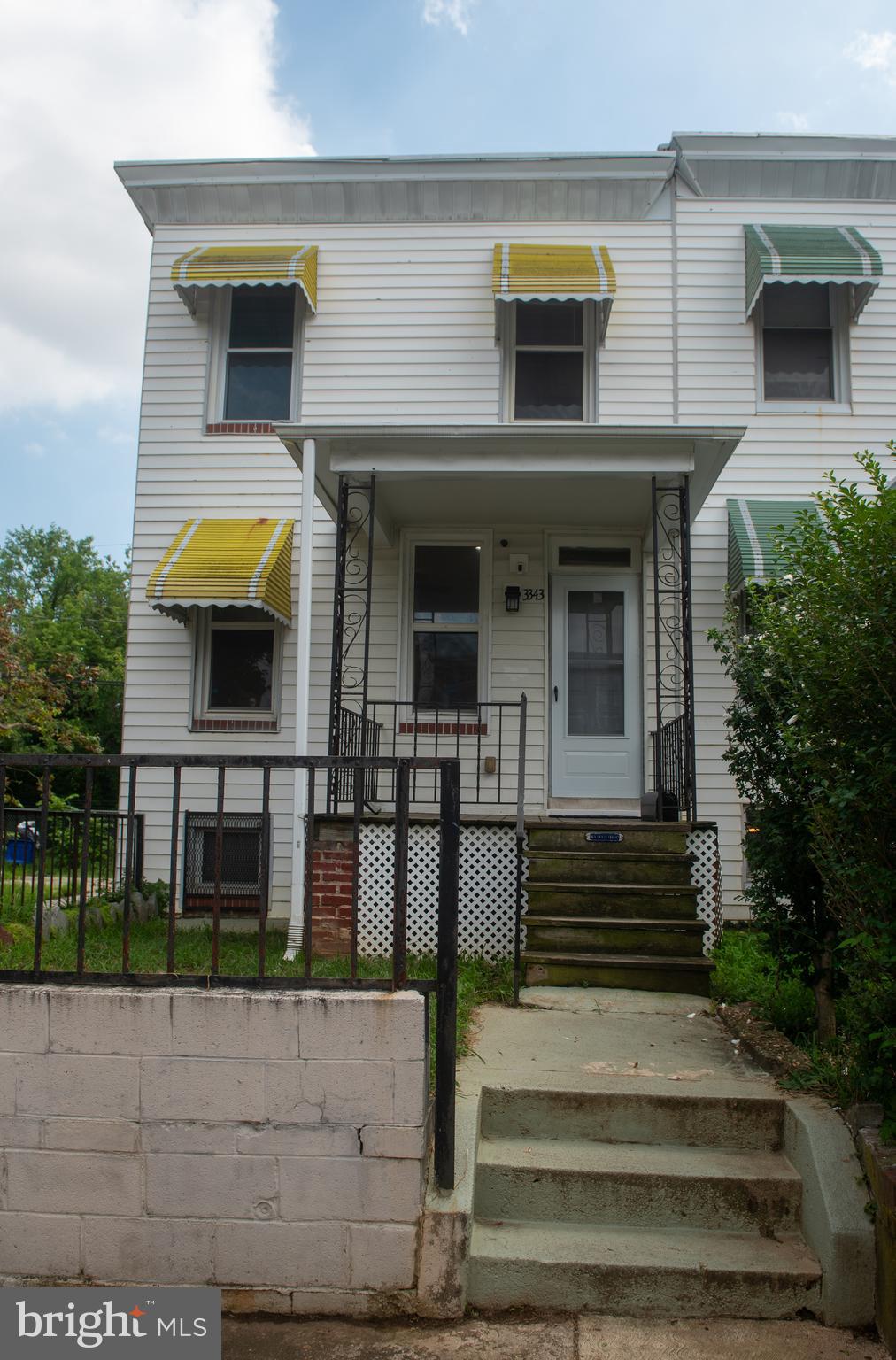 Welcome to 3343 Ravenwood Avenue, a beautifully updated end-unit row home in Baltimore’s Four By Four neighborhood. This 3-bedroom, 2-full-bath home features an open-concept main level with new flooring, recessed lighting, and a modern kitchen complete with granite countertops and stainless steel appliances. Upstairs you'll find two bright bedrooms and a renovated full bath, while the finished basement offers a third bedroom, second full bath, and flexible space for a home office, guest suite, or rec room. As an end unit, the home enjoys extra natural light. Located just blocks from Clifton Park, Lake Montebello, and Herring Run Park, with easy access to major commuter routes and local amenities along Belair Road, this turnkey home offers comfort, style, and convenience at an excellent value.